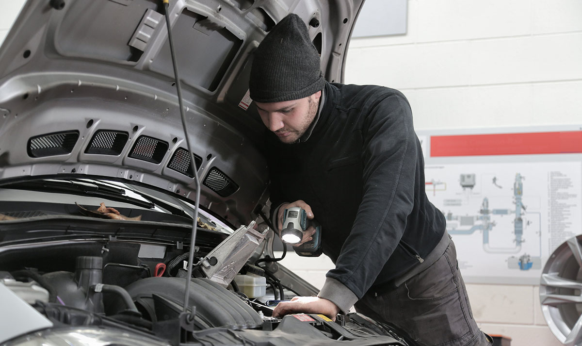 someone fixing their car